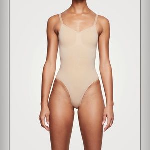 SKIMS Sculpting Bodysuit With Snaps in CLAY